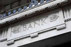 Stock photo of "BANK" inscription on stone building