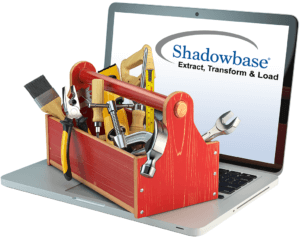 Stock photo of small toolbox with handyman tools on a laptop