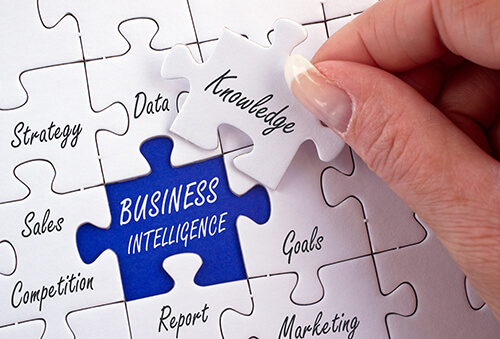 Stock photo of what is bussiness intelligence puzzle pieces with words