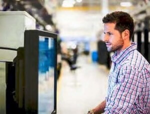 Stock photo of man starting at a screen