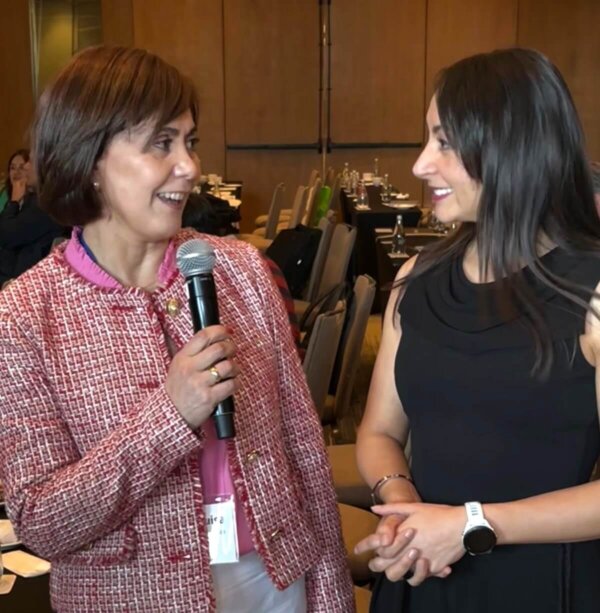Maria Mendoza (left) with Tatiana Andrews, Master of Ceremonies