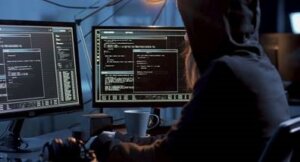 Hacker on computer