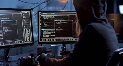 Hacker on computer